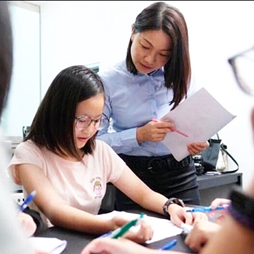 Teacher Karen with a student